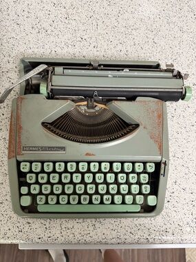 Hermes Baby mint green portable typewriter